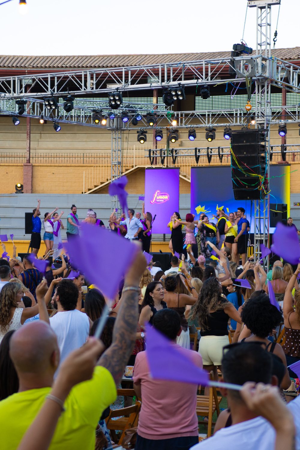 Furor The Show audience waving flags at the Plaza de Toros de Torremolinos