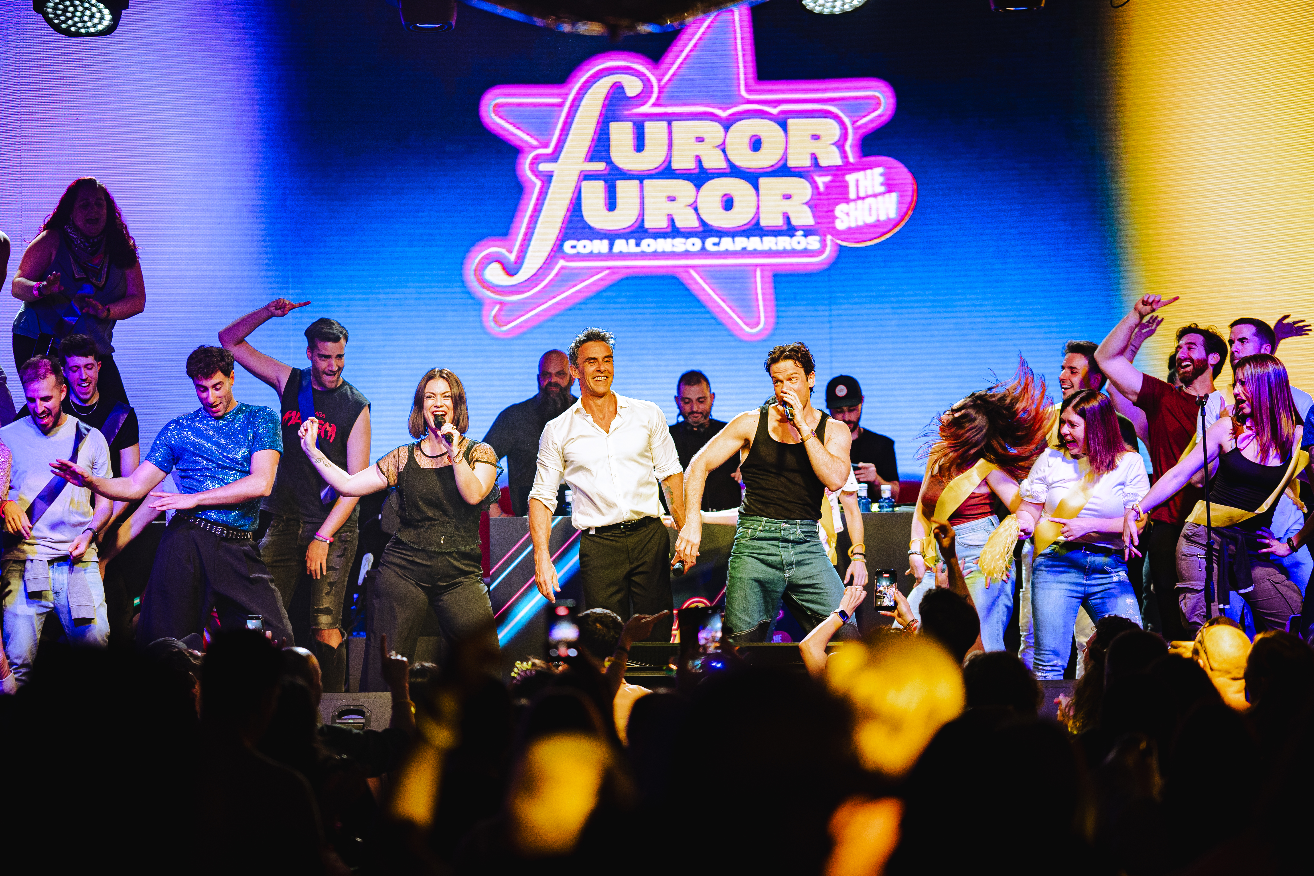 Alonso Caparrós and the Furor The Show cast performing on stage during a live show